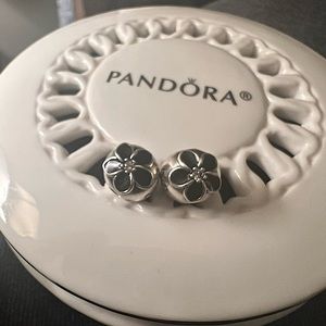 Authentic Pandora charms; sterling silver .925 ALE marked.Two black flower clips